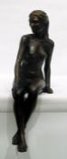 Cold cast bronze-finish figure of a seated nude