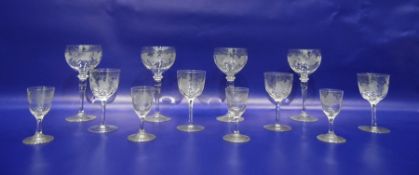 Assorted wines and sherry glasses etched with grapes on vine decoration