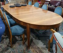 Custom made cherrywood extending dining table together with leaf cabinet, extending to seat 22