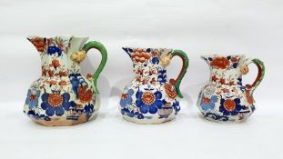 Three graduated Masons Ironstone pottery jugs, 'Im