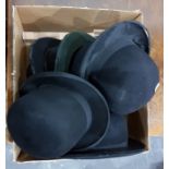 Six bowler hats and perspex stands, including examples by Hope Brothers