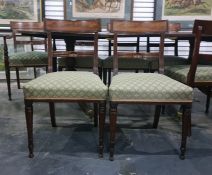 George IV set of eight mahogany dining chairs including pair of carver armchairs each with reeded
