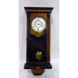 Late 19th century walnut cased wall clock with enamel dial and Roman numerals, glazed door and