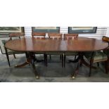 Georgian style mahogany twin-pedestal dining table with rounded ends and reeded border, on turned