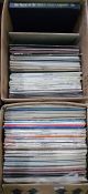 Two boxes of LP records to  include The Beatles "Sergeant Pepper's Lonely Hearts Club Band", Abba
