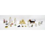 Assorted decorative ceramic items to include figurines of dogs and continental porcelain figurines