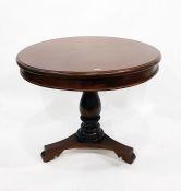 Victorian style mahogany circular top supper table with moulded edge, plain frieze, on turned