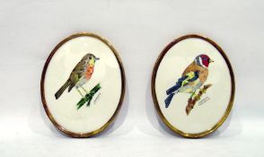 Pair of Goebel wall plaques, one decorated with gold finch, the other with robin, both hand-