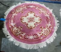 Chinese puce ground rug, the cream ground fl