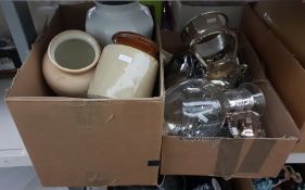 Three boxes of assorted items to include glass and white metal carafe, various stoneware jars, etc