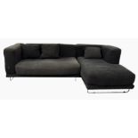 Modern L-shaped sofa with chromed steel frame, in two sections, with loose squab cushions and