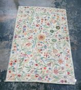 Kashmiri wool chainstitch rug, cloth backed and having naturalistic flowering sprays on a cream