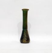 Green glass phial, possibly Roman, 14cm high