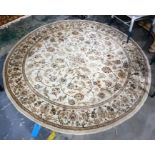 20th century Persian style wool rug, circular, the cream ground with scrolling stylised floral