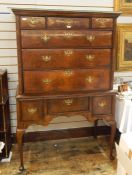 Early 18th century walnut chest on stand with ogee stepped cornice, fitted three short and three