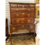 Early 18th century walnut chest on stand with ogee stepped cornice, fitted three short and three