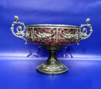 Electroplated twin-handled bowl with a pink glass liner, 17cm high