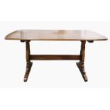 Modern Ercol elm refectory style table with rounded corners, on twin pedestal supports with