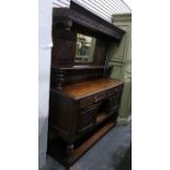 19th century Jacobean revival carved oak mirror back sideboard, the frieze with lunette carving, the