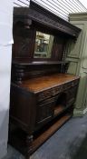 19th century Jacobean revival carved oak mirror back sideboard, the frieze with lunette carving, the
