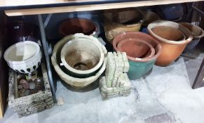 Large quantity of assorted planters to include terracotta examples, composite stone trough, etc