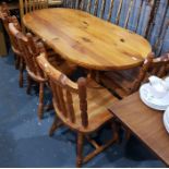 Pine kitchen table and a set of four pine kitchen