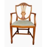 Set of six stained beech Hepplewhite-style dining chairs with shield-shaped backs, carved pierced