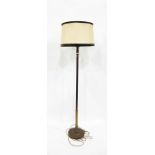 Brass lamp standard with circular platform base, reeded column and shade