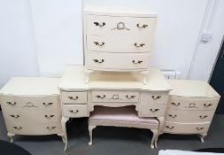 Suite of white painted bedroom furniture to include dressing table, stool and three small three-