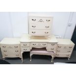 Suite of white painted bedroom furniture to include dressing table, stool and three small three-
