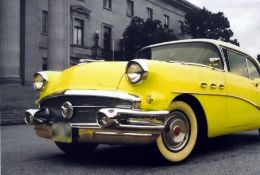 Two 20th century prints on canvas of classic American cars, 70cm x 100cm (2)