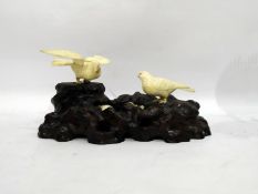 Japanese ivory and treen ornament as birds with two chicks in nest