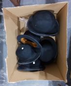 Six bowler hats on perspex stands, to include examples by Moores, Bradleys