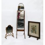 Oak framed firescreen with floral needlework panel, a Hepplewhite style shield-shaped dressing table