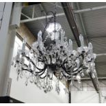 Elaborate 18-light prismatic chandelier with swags and pendulum drops