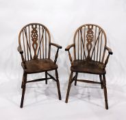 Two Elm seated wheelback Windsor elbow chairs