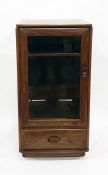 Ercol Furniture glazed cabinet, the panelled door enclosing shelf with drawer below, width 50cm