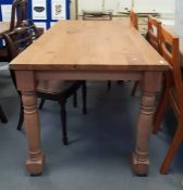 Rectangular oak dining table on turned beech suppo