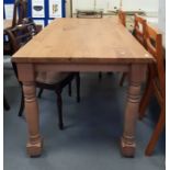 Rectangular oak dining table on turned beech suppo