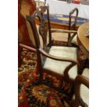 Antique mahogany carver's Chippendale-style open armchair with scroll top rail, pierced scroll