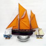 Model of a Brixham trawler, two other miniature models of fishing boat and a yacht and an