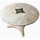 After the antique, a circular bleached walnut kitchen/breakfast table, the top with concave