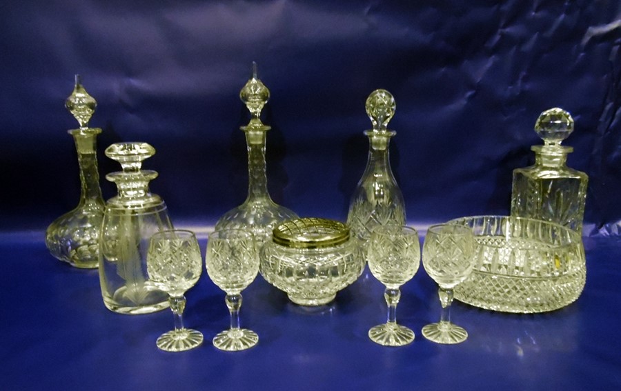 Five glass decanters, a cut glass bowl, four wine glasses and a clear glass rose bowl (11)