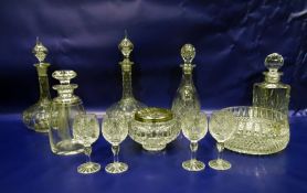 Five glass decanters, a cut glass bowl, four wine glasses and a clear glass rose bowl (11)