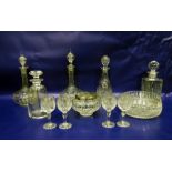 Five glass decanters, a cut glass bowl, four wine glasses and a clear glass rose bowl (11)