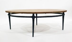 Unpolished elliptical-shaped coffee table on metal underframe, 122cm x 62cm