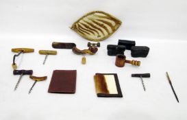 Assorted miscellanea to include vintage corkscrews, African hide shield, opera glasses, etc