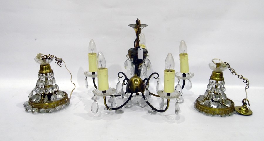 Five-branch chandelier with prism cut drops and a pair of prism cut gilt metal pendant lights (3)