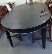 Contemporary black lacquer dining table with rounded ends, on square tapering legs, with two extra