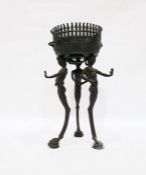 Continental bronze bowl with spiked rim, raised upon three satyrs